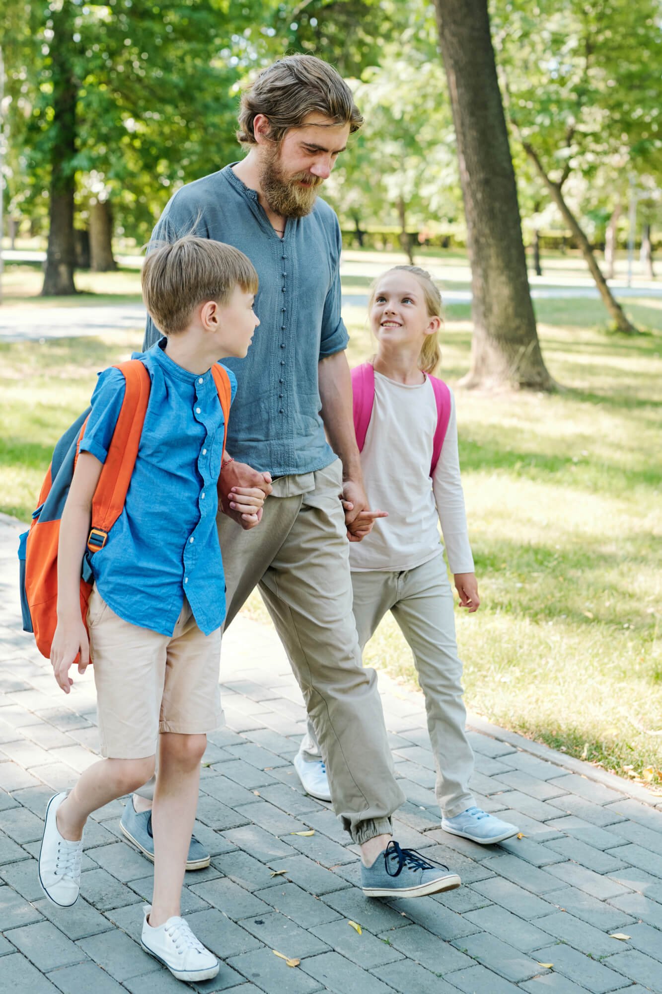 father-walking-kids-to-school.jpg